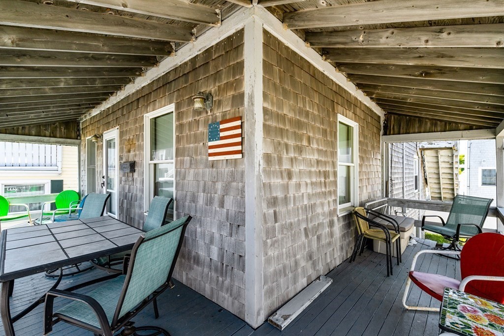156 Turner Road Scituate, MA 02066 - Photo 7 of 24 a view of a porch with furniture