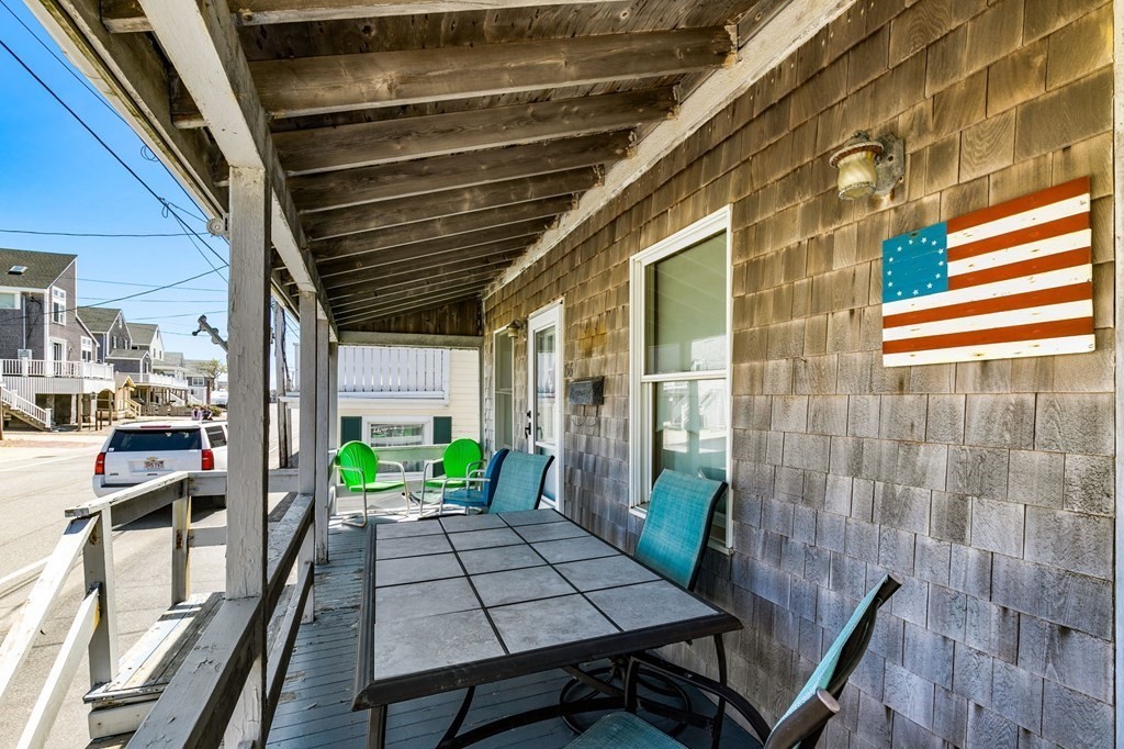 156 Turner Road Scituate, MA 02066 - Photo 8 of 24 a view of a patio with table and chairs barbeque with wooden floor and plants