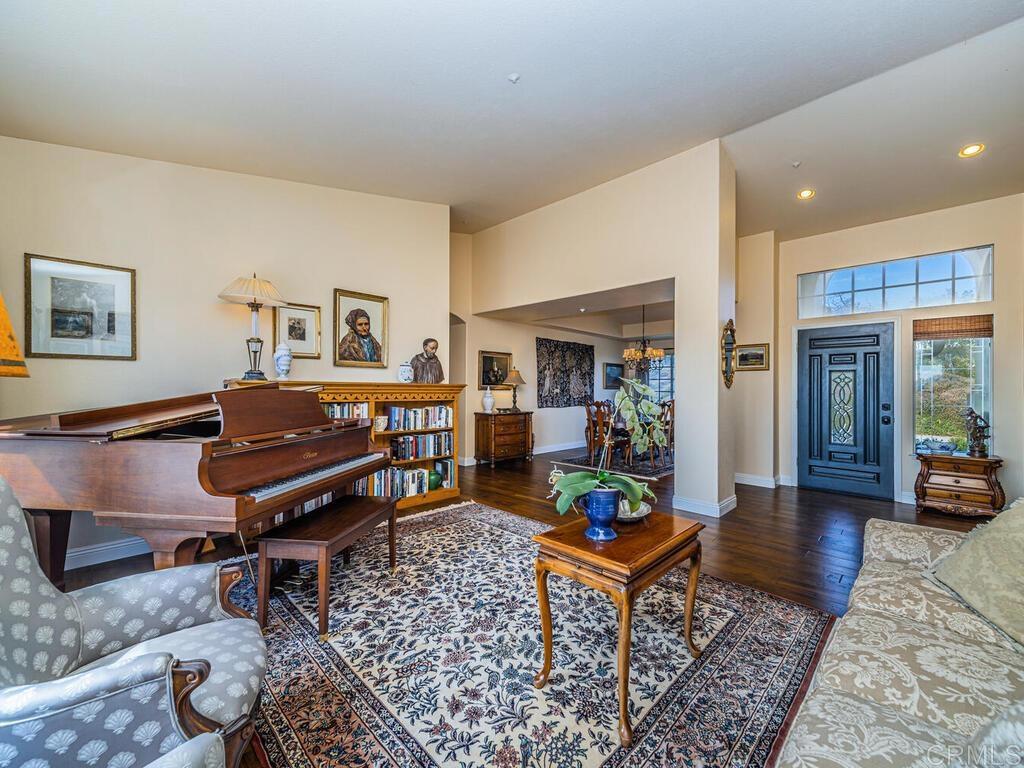30568 Roadrunner Ridge Valley Center, CA 92082 - Photo 11 of 56 a living room with furniture and a piano