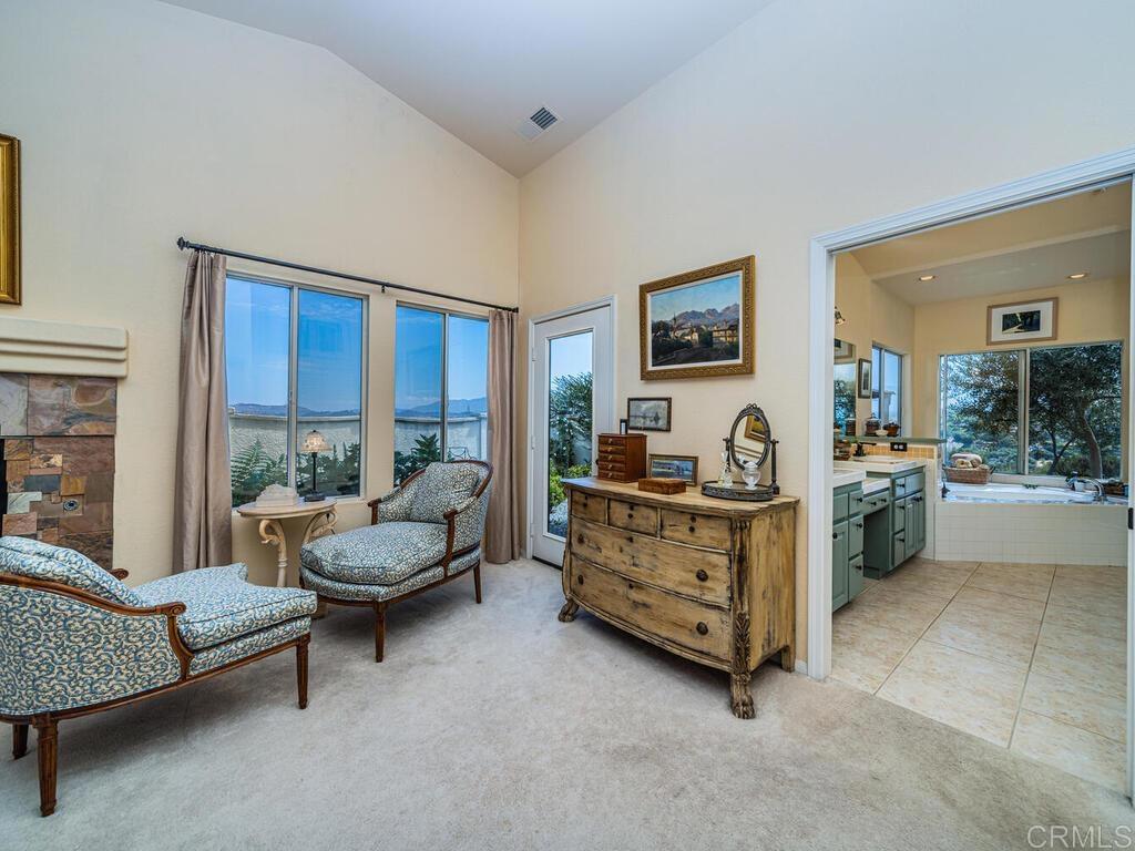 30568 Roadrunner Ridge Valley Center, CA 92082 - Photo 25 of 56 a living room with furniture and a window