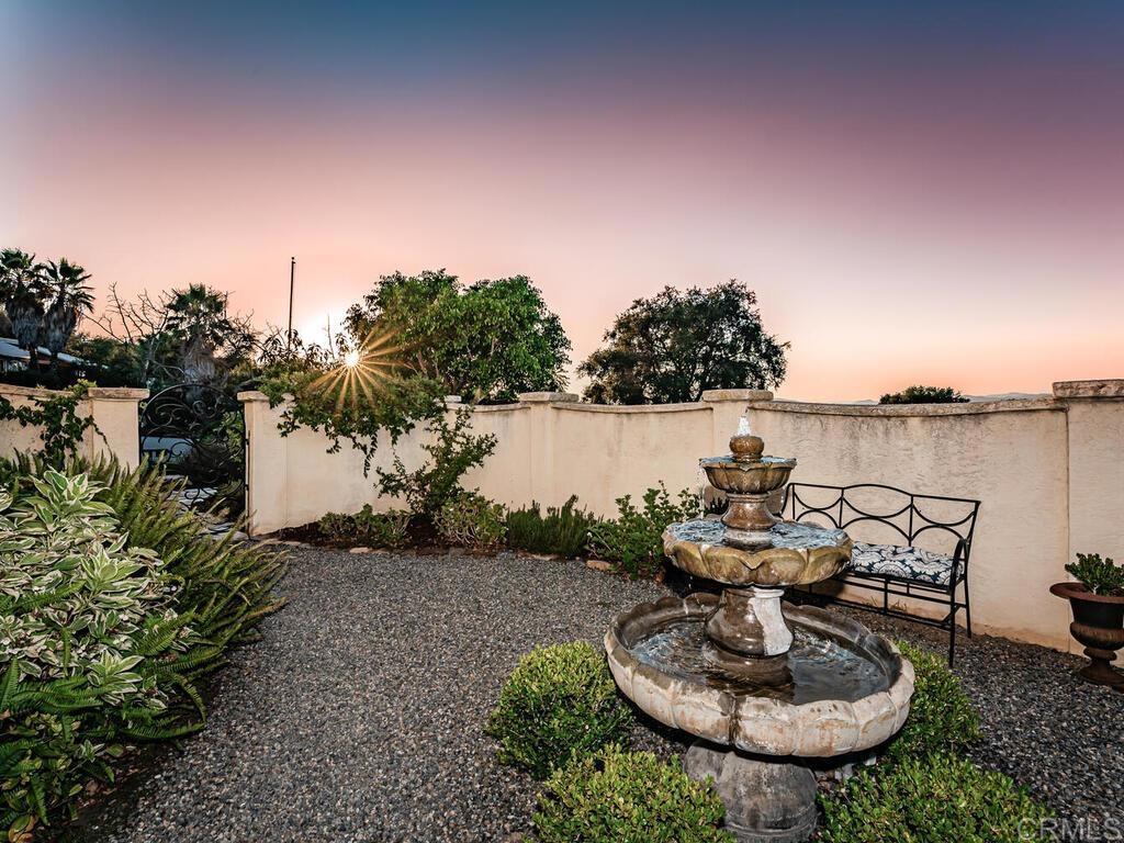 30568 Roadrunner Ridge Valley Center, CA 92082 - Photo 41 of 56 a view of a swimming pool with a patio and a garden