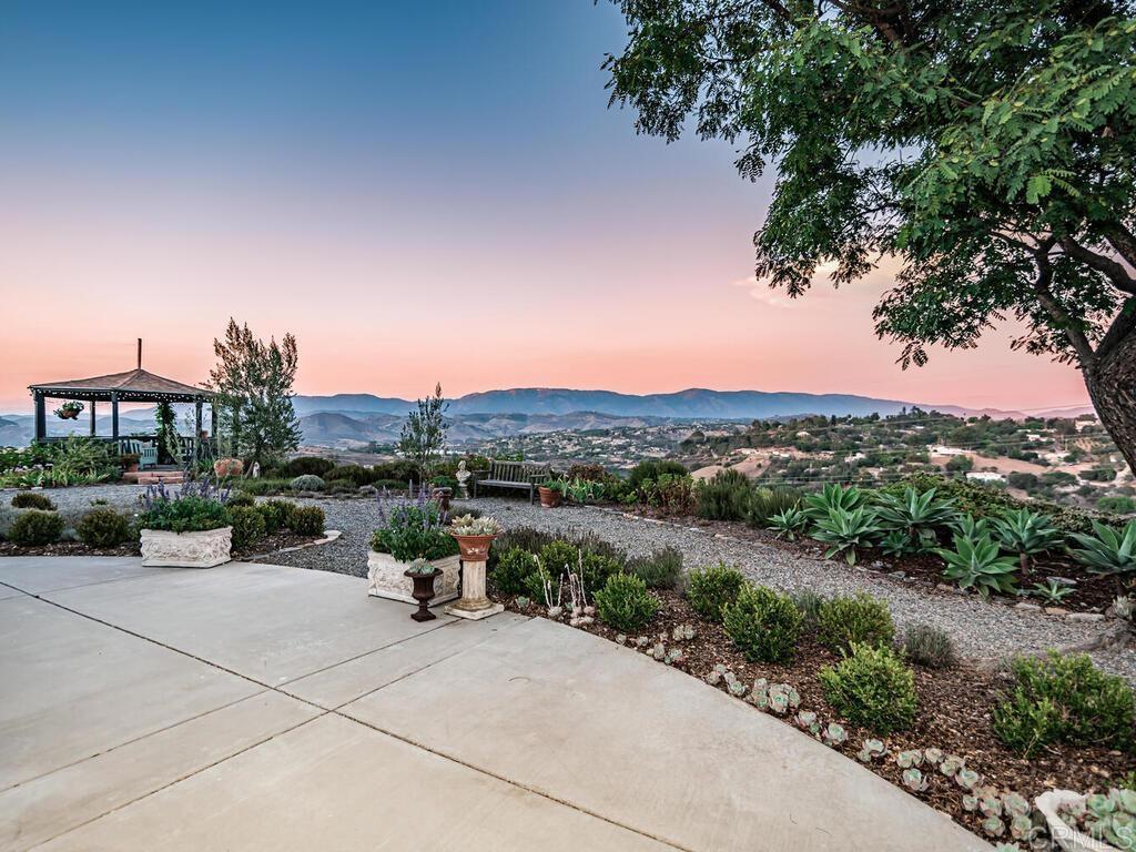 30568 Roadrunner Ridge Valley Center, CA 92082 - Photo 46 of 56 a view of a terrace with a bench and a fire pit