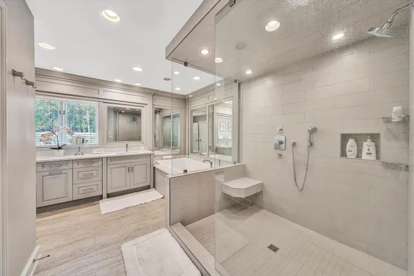a kitchen with a stove a sink and cabinets
