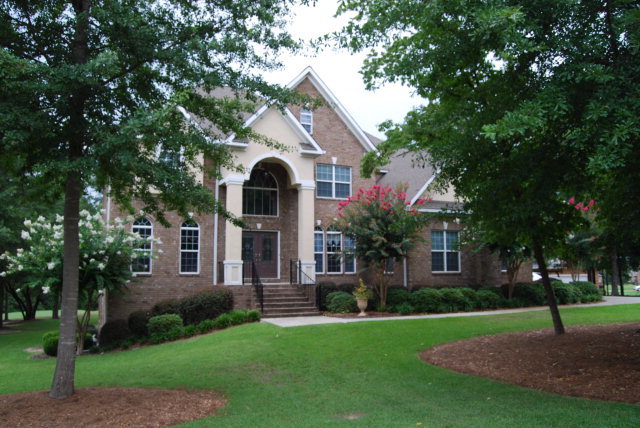 330 Eagle Ridge Road Macon, GA 31216 - Photo 1 of 41 a front view of a house with a yard