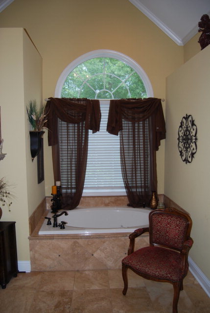 330 Eagle Ridge Road Macon, GA 31216 - Photo 22 of 41 a living room with furniture and a fireplace