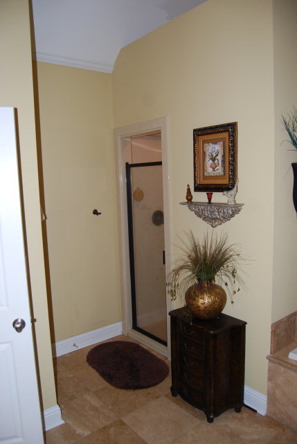 330 Eagle Ridge Road Macon, GA 31216 - Photo 23 of 41 a living room with furniture and a painting on the wall