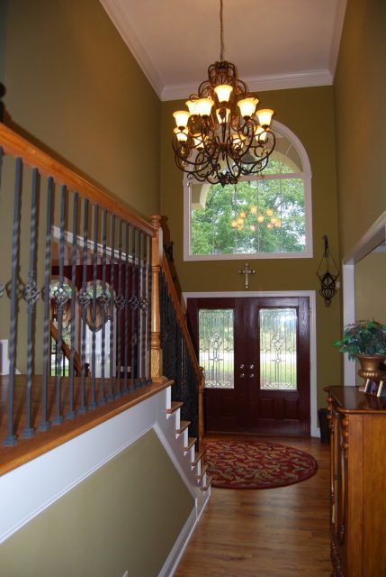 330 Eagle Ridge Road Macon, GA 31216 - Photo 5 of 41 a view of a dining room with furniture a chandelier and window
