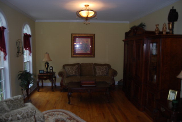 330 Eagle Ridge Road Macon, GA 31216 - Photo 7 of 41 a living room with furniture and a lamp