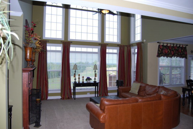 330 Eagle Ridge Road Macon, GA 31216 - Photo 8 of 41 a living room with furniture and a floor to ceiling window