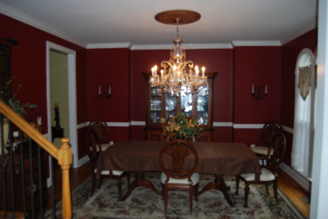 330 Eagle Ridge Road Macon, GA 31216 - Photo 10 of 41 a view of a dining room with furniture and chandelier