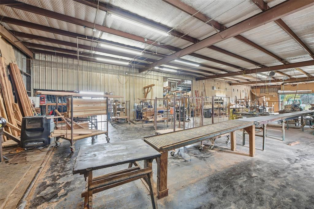 9510 Swafford Road Justin, TX 76247 - Photo 20 of 28 a view of a room with lots of wooden furniture