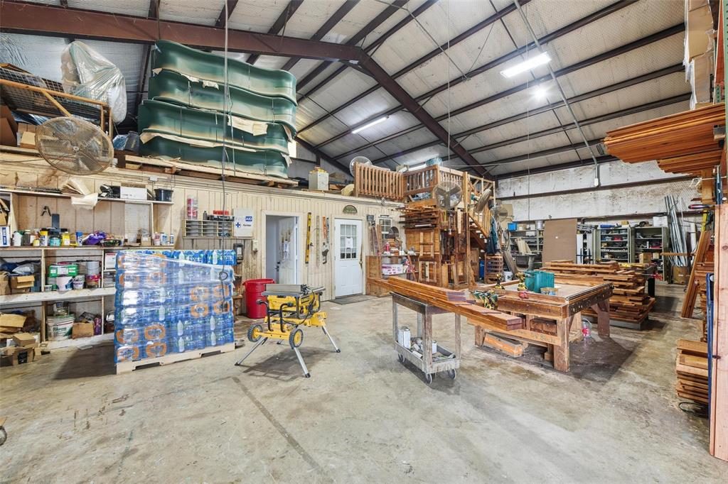 9510 Swafford Road Justin, TX 76247 - Photo 21 of 28 a view of store room with racks