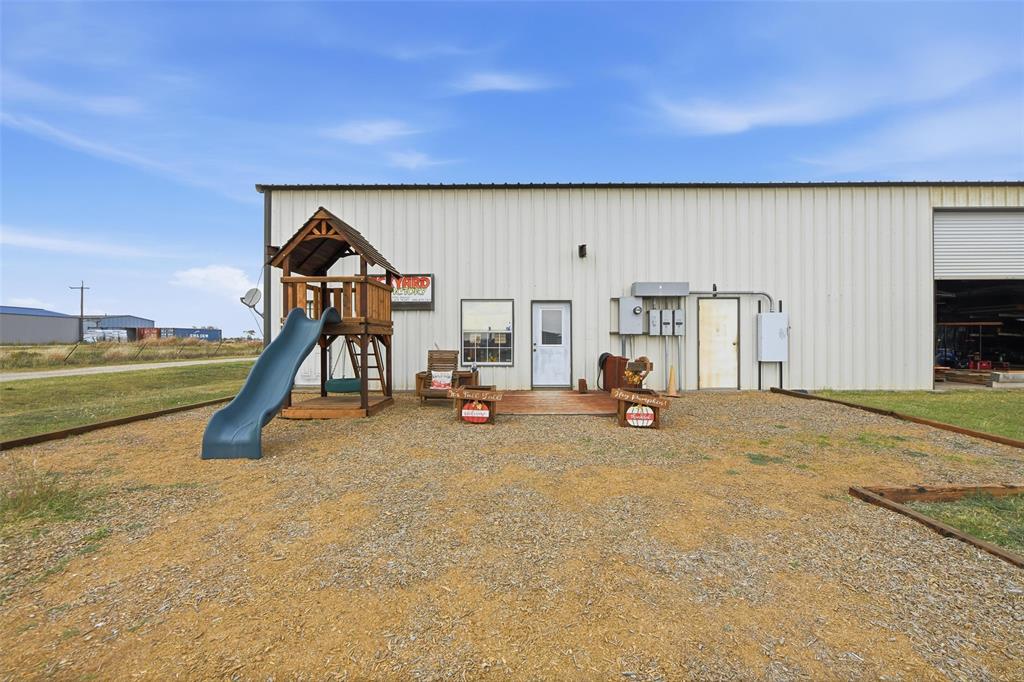 9510 Swafford Road Justin, TX 76247 - Photo 25 of 28 a view of a room with gym equipment