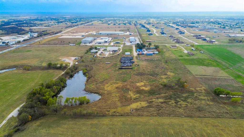 9510 Swafford Road Justin, TX 76247 - Photo 7 of 28 an aerial view of residential houses with outdoor space