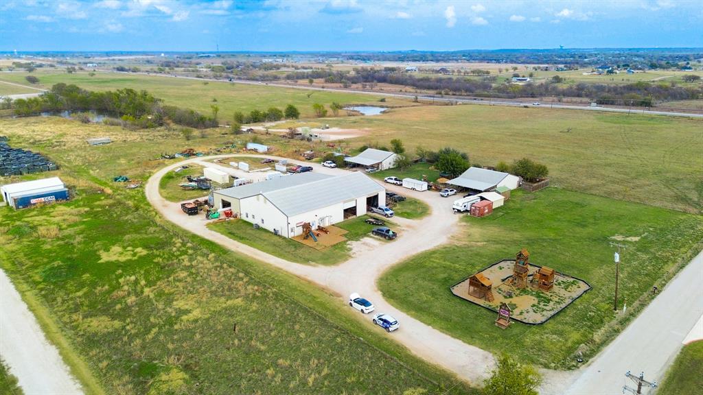 9510 Swafford Road Justin, TX 76247 - Photo 9 of 28 a view of a city and an ocean view