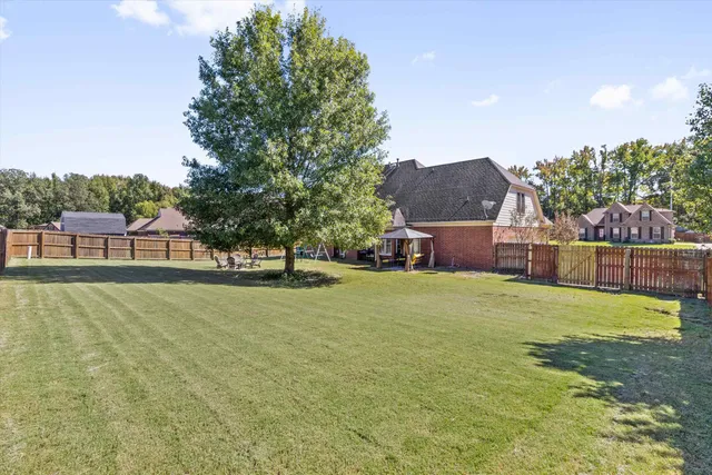 a house view with a garden space