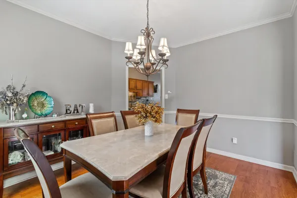 a kitchen with a stove a sink and a microwave