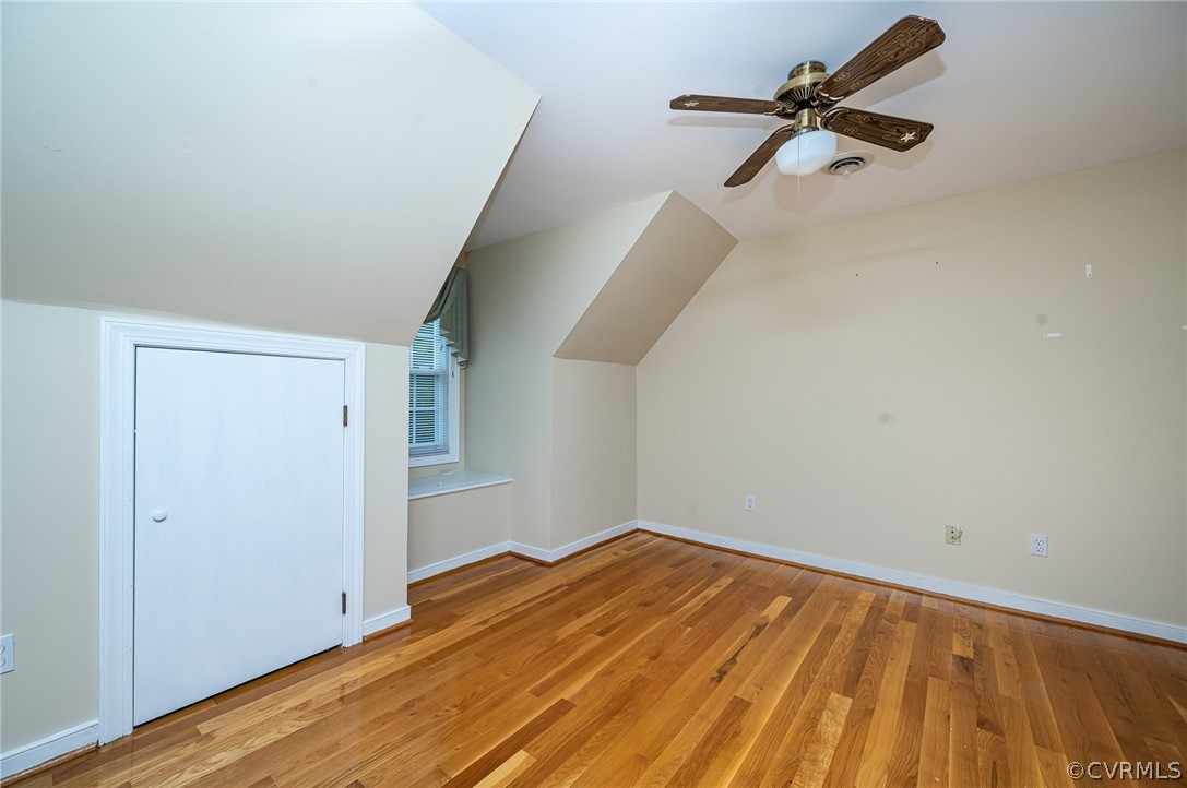 22508 Carson Road Dinwiddie, VA 23841 - Photo 21 of 50 a view of a room with wooden floor and a ceiling fan