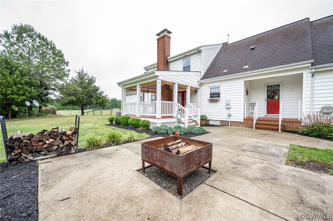 22508 Carson Road Dinwiddie, VA 23841 - Photo 29 of 50 a front view of a house with a garden