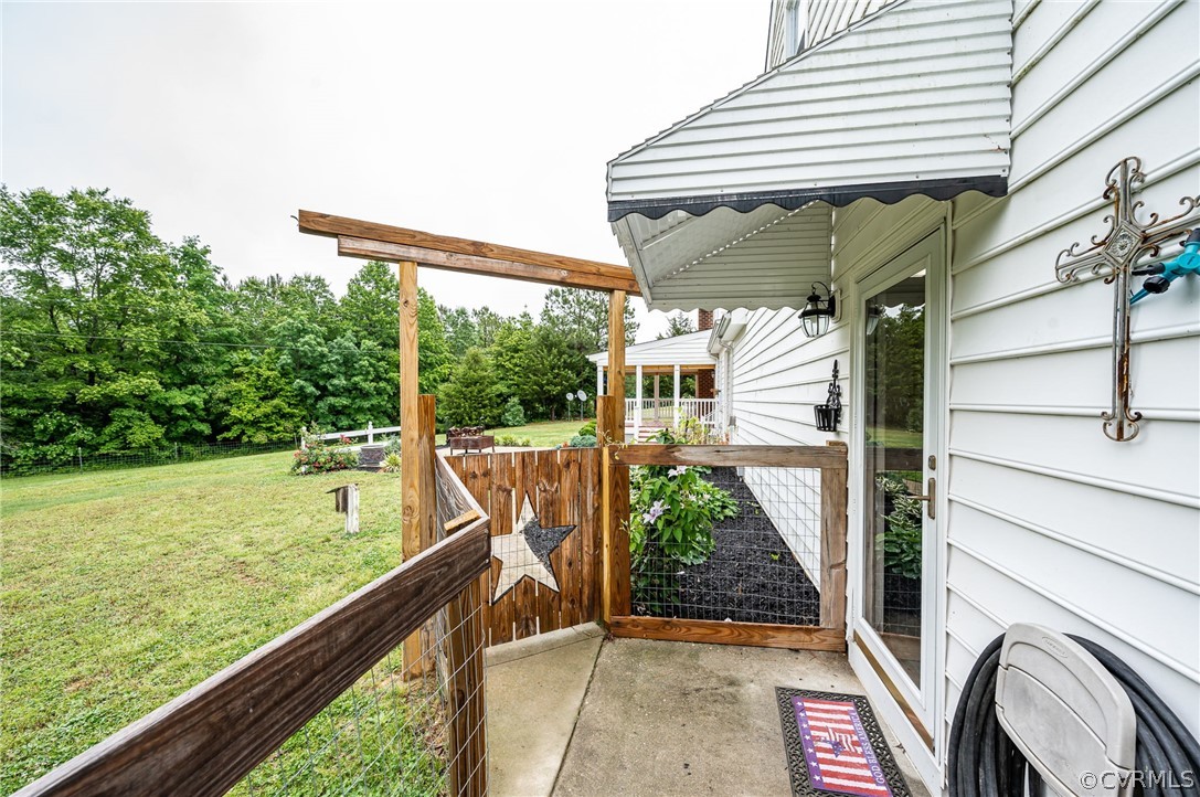 22508 Carson Road Dinwiddie, VA 23841 - Photo 30 of 50 a view of a balcony with chairs