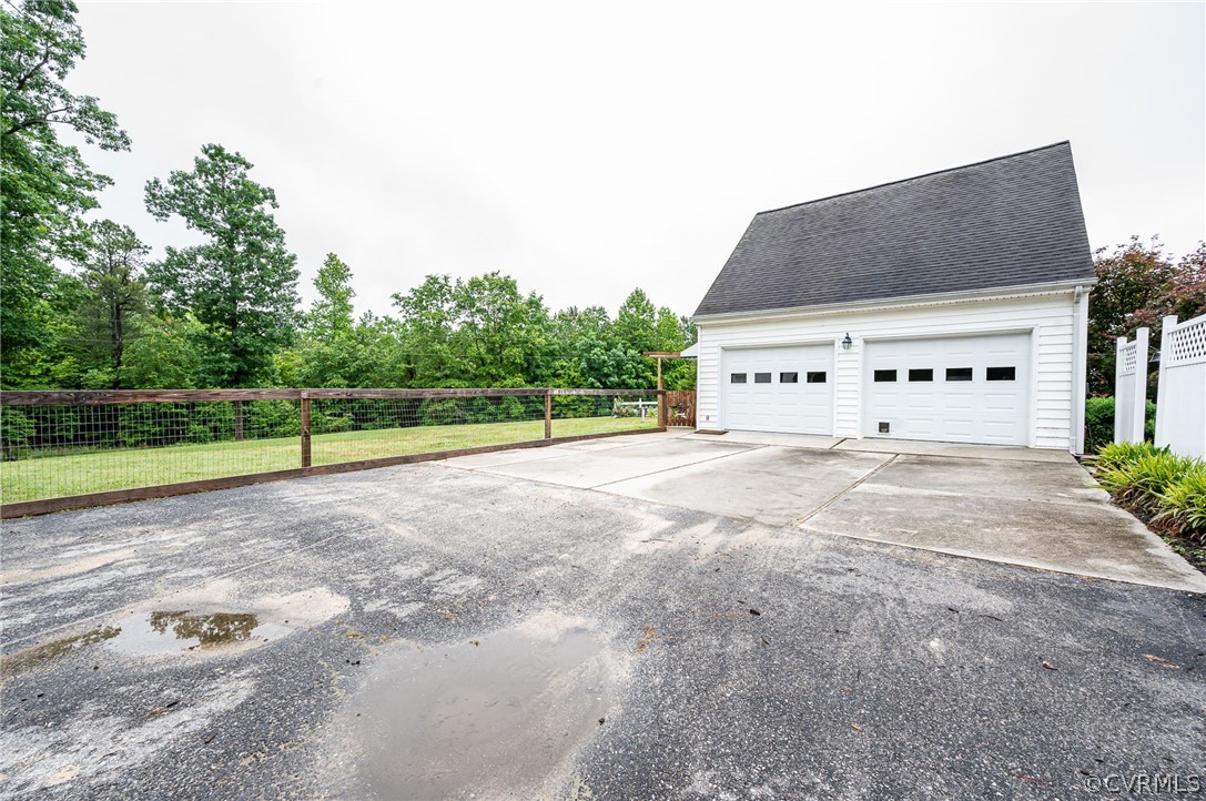 22508 Carson Road Dinwiddie, VA 23841 - Photo 31 of 50 a view of a big house with a big yard and large trees