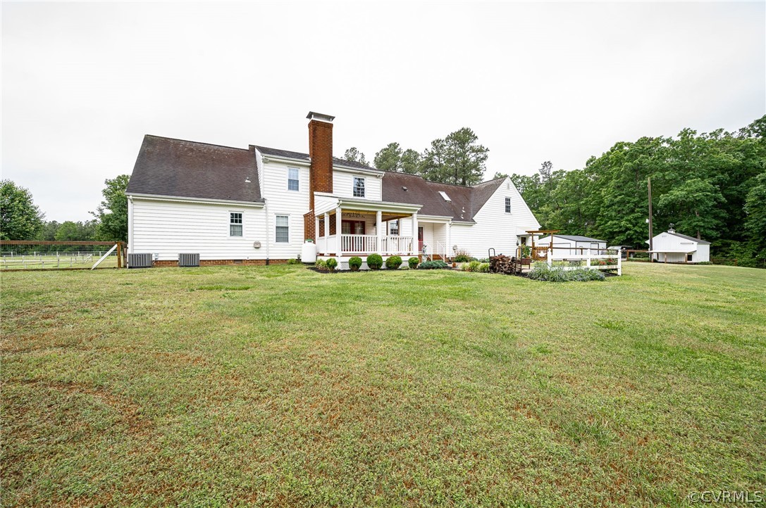 22508 Carson Road Dinwiddie, VA 23841 - Photo 34 of 50 a front view of a house with a yard