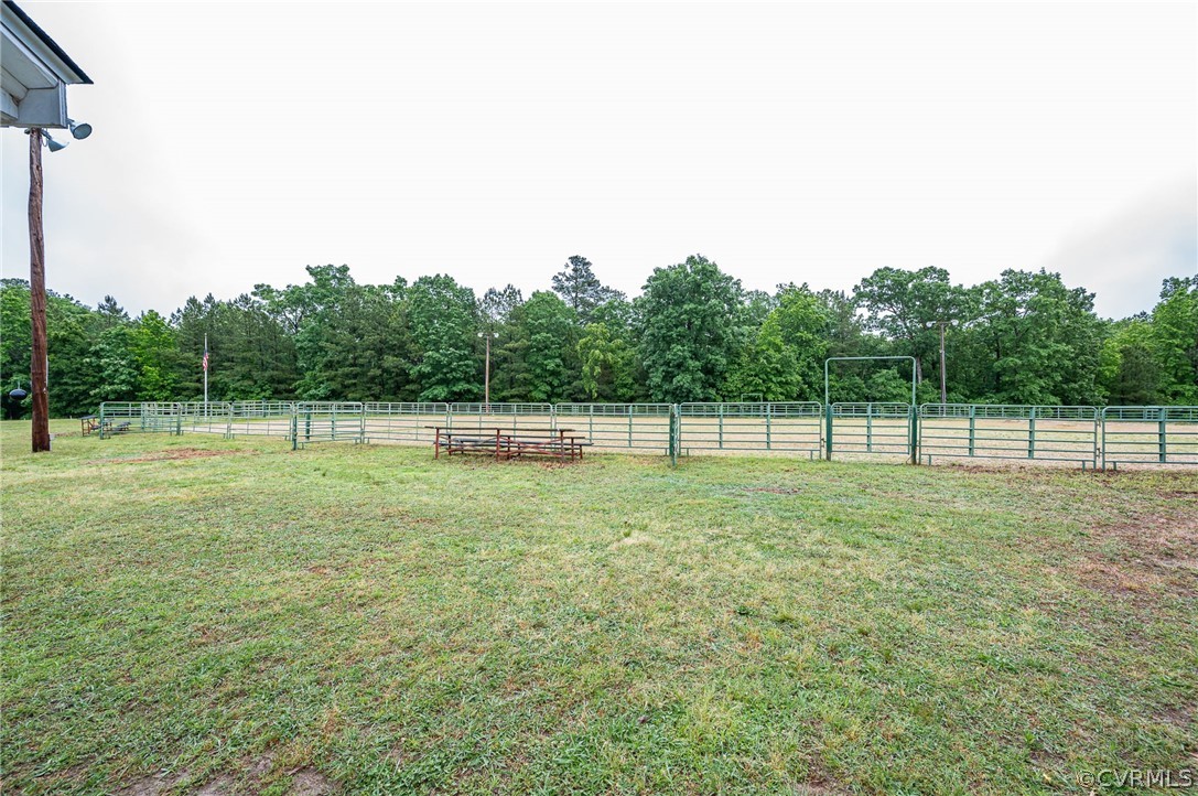 22508 Carson Road Dinwiddie, VA 23841 - Photo 43 of 50 a view of a field with trees in the background