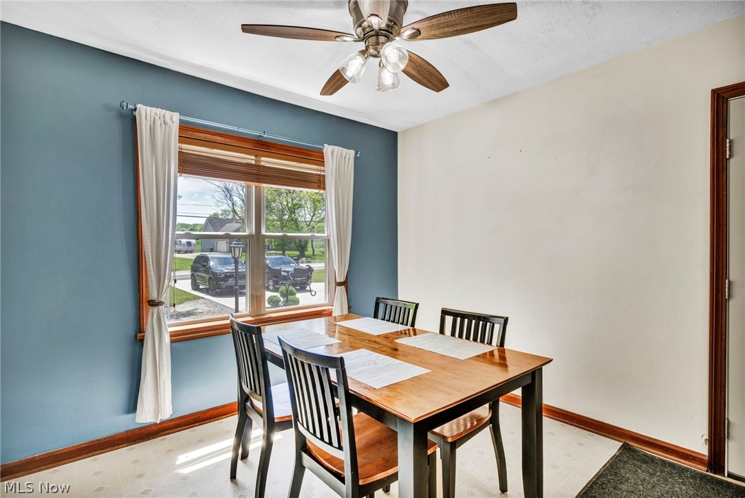 7983 Wadsworth Road Medina, OH 44256 - Photo 14 of 42 Tiled dining space featuring ceiling fan