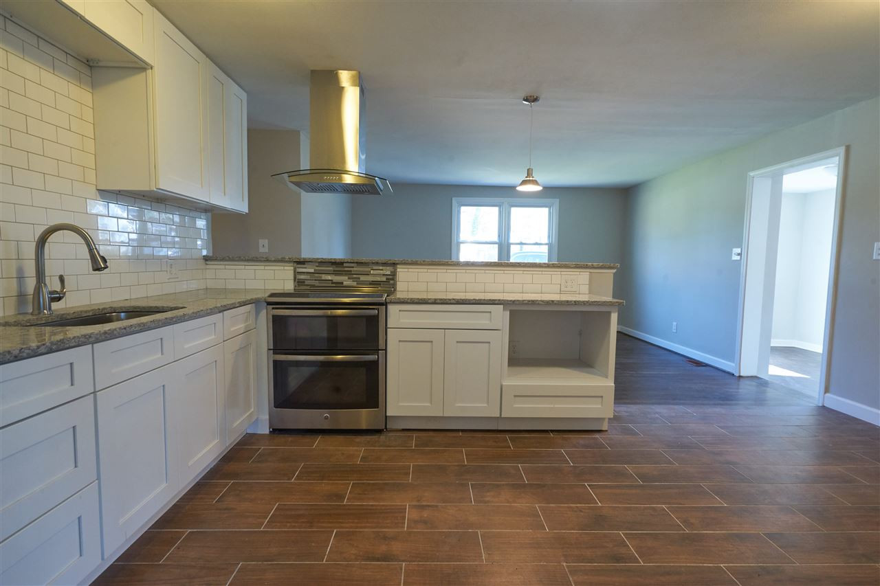 3201 Apache Drive Raleigh, NC 27609 - Photo 8 of 30 New appliances/microwave cabinet