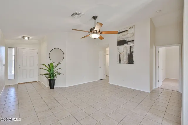 a view of an empty room and window