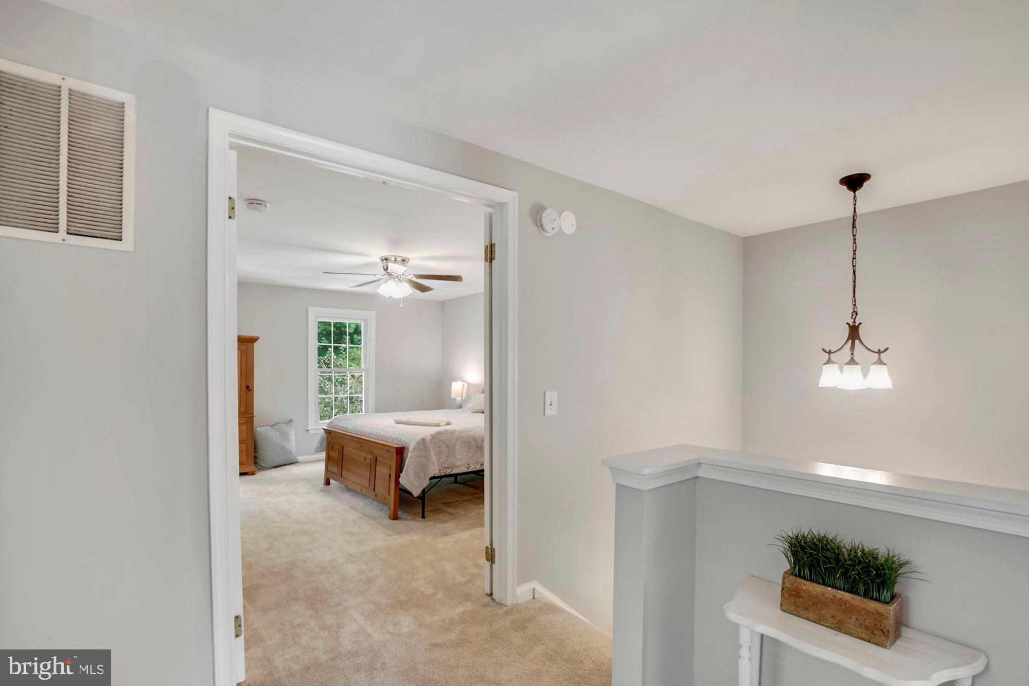 12903 Tourmaline Terrace Silver Spring, MD 20904 - Photo 31 of 41 Freshly Painted Spacious Hall way w/ New Carpet