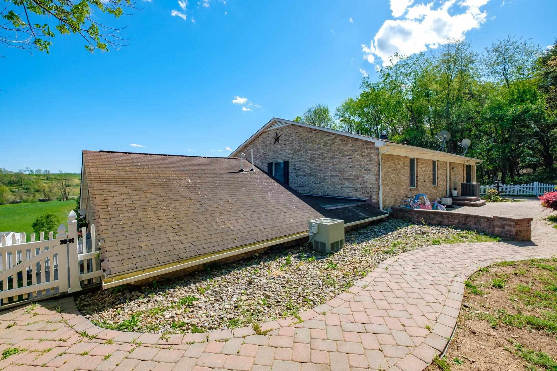 556 Buttermilk Spring Road Staunton, VA 24401 - Photo 50 of 67 a view of a garden with an outdoor seating