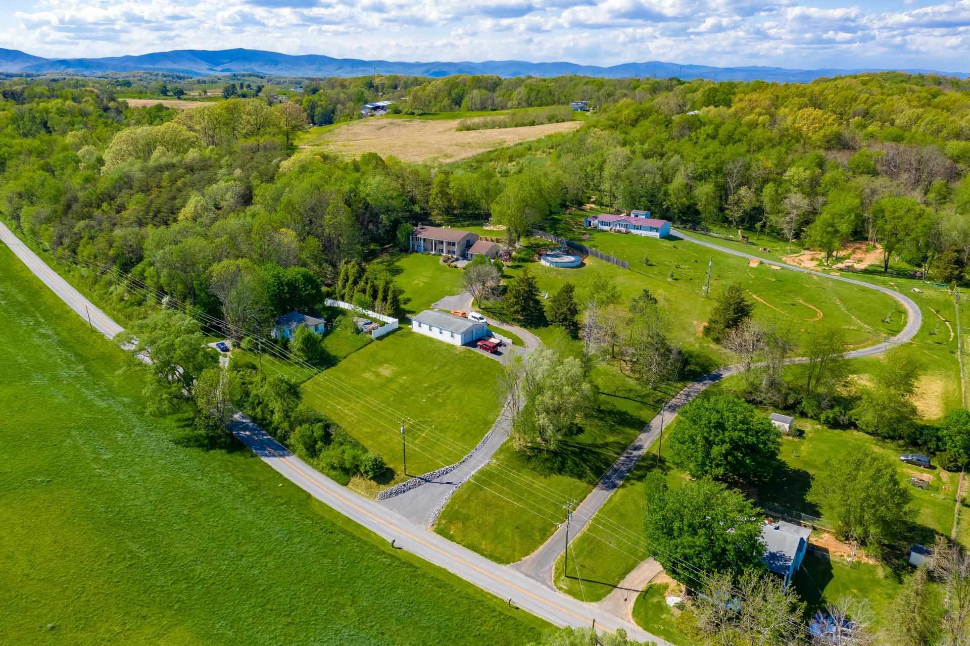 556 Buttermilk Spring Road Staunton, VA 24401 - Photo 65 of 67 a view of a swimming pool with a garden