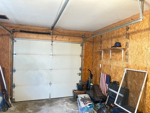 2194 North Santom Road Stow, OH 44224 - Photo 18 of 29 Attached garage leads into the dining room and offers attic storage.