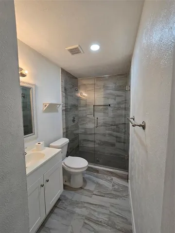 a view of a backyard of the house