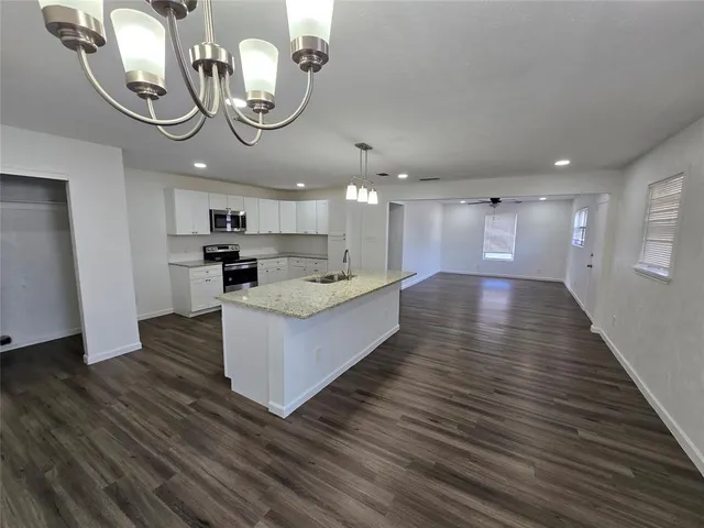 en view of an empty room with a window