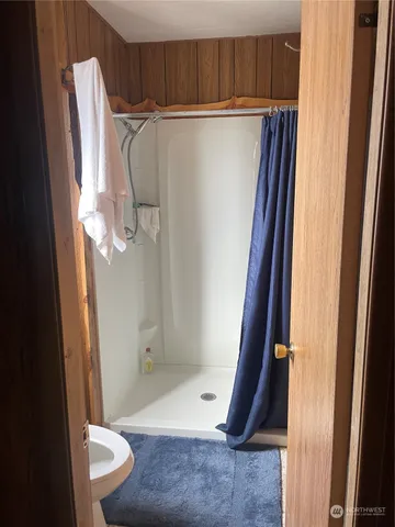 a bathroom with a sink and toilet