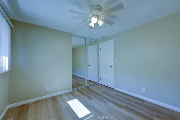 a bathroom with a double vanity sink and mirror