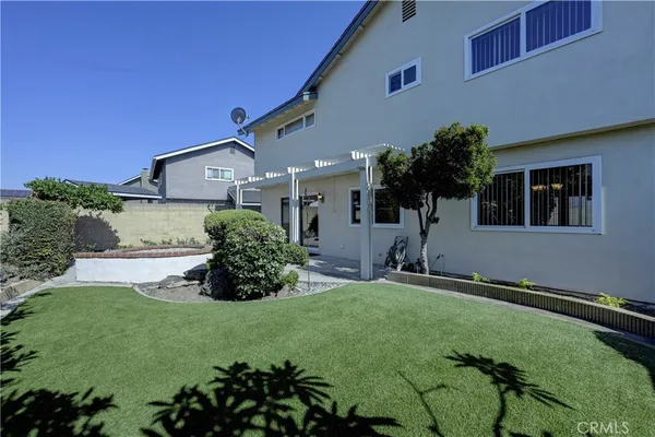 a view of swimming pool with a yard