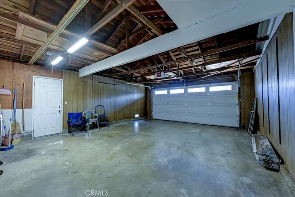 a view of a patio with a backyard