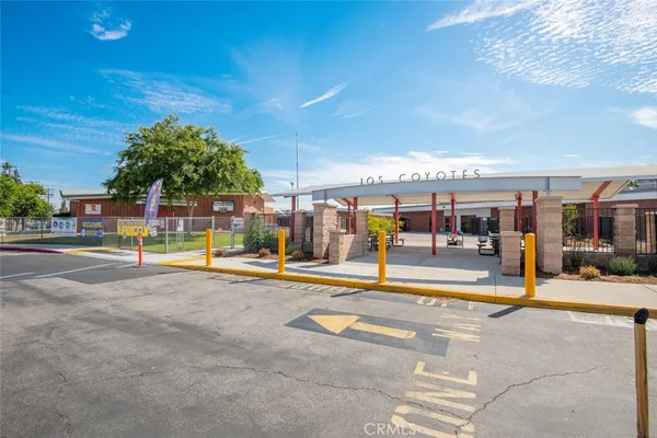 a view of a golf course with a big yard