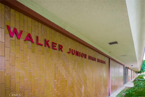 a view of swimming pool with outdoor seating