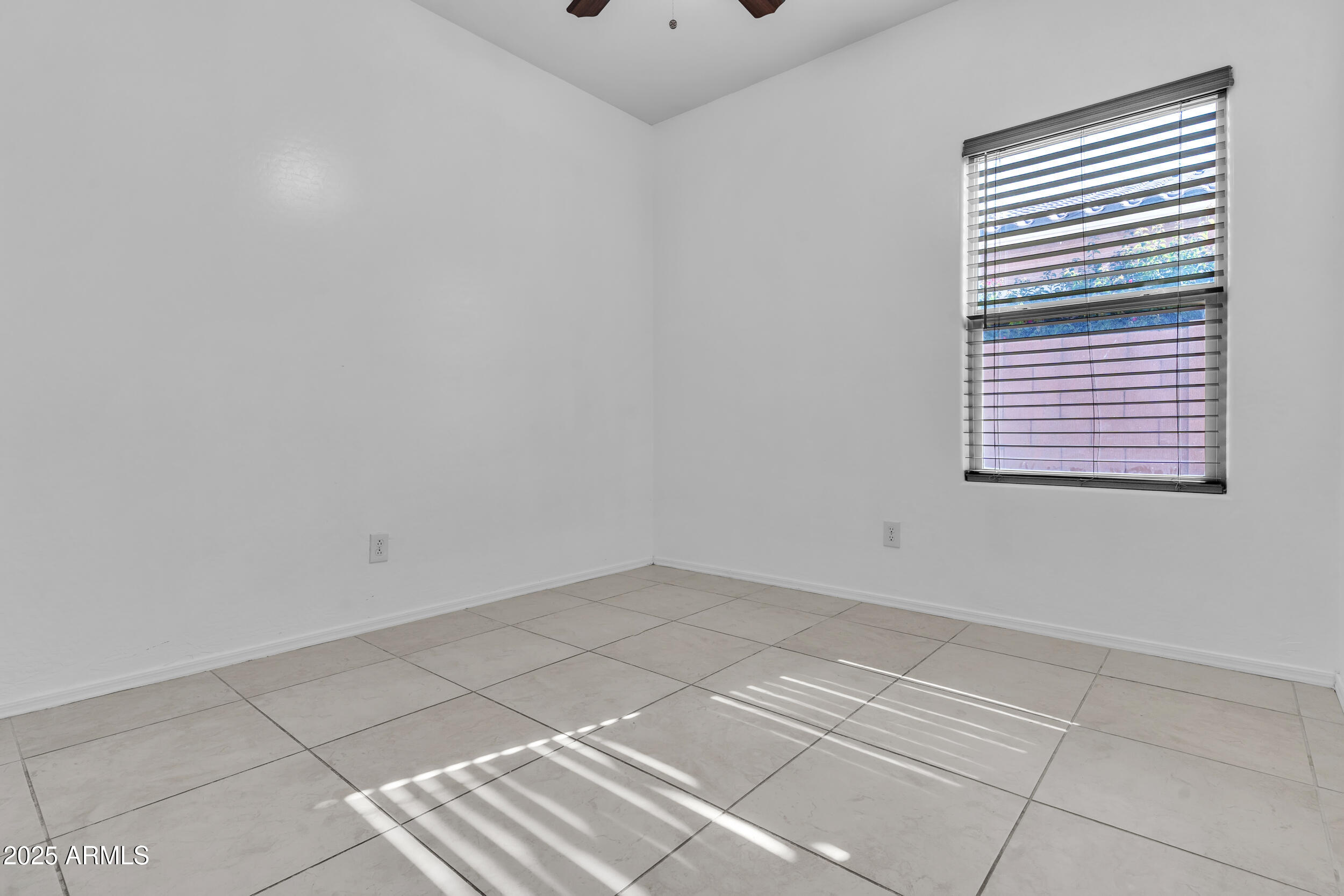 2354 East Bellerive Drive Gilbert, AZ 85298 - Photo 11 of 34 a view of an empty room with a window