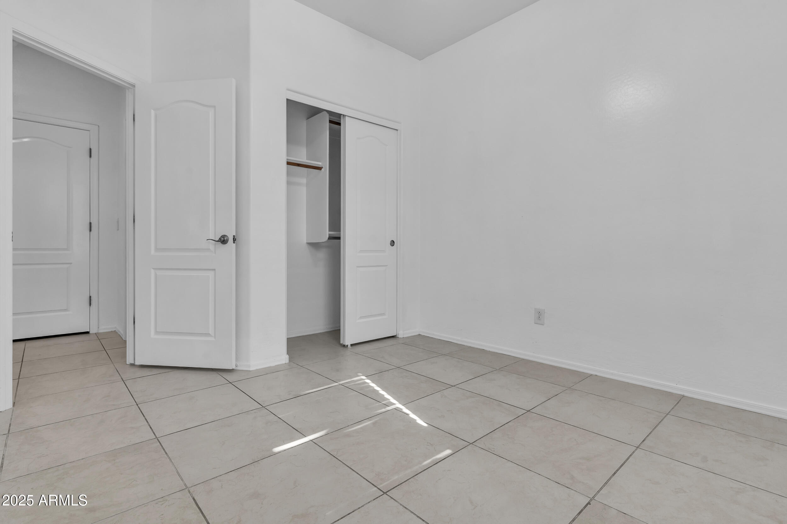 2354 East Bellerive Drive Gilbert, AZ 85298 - Photo 12 of 34 a view of a livingroom with an empty space and a window