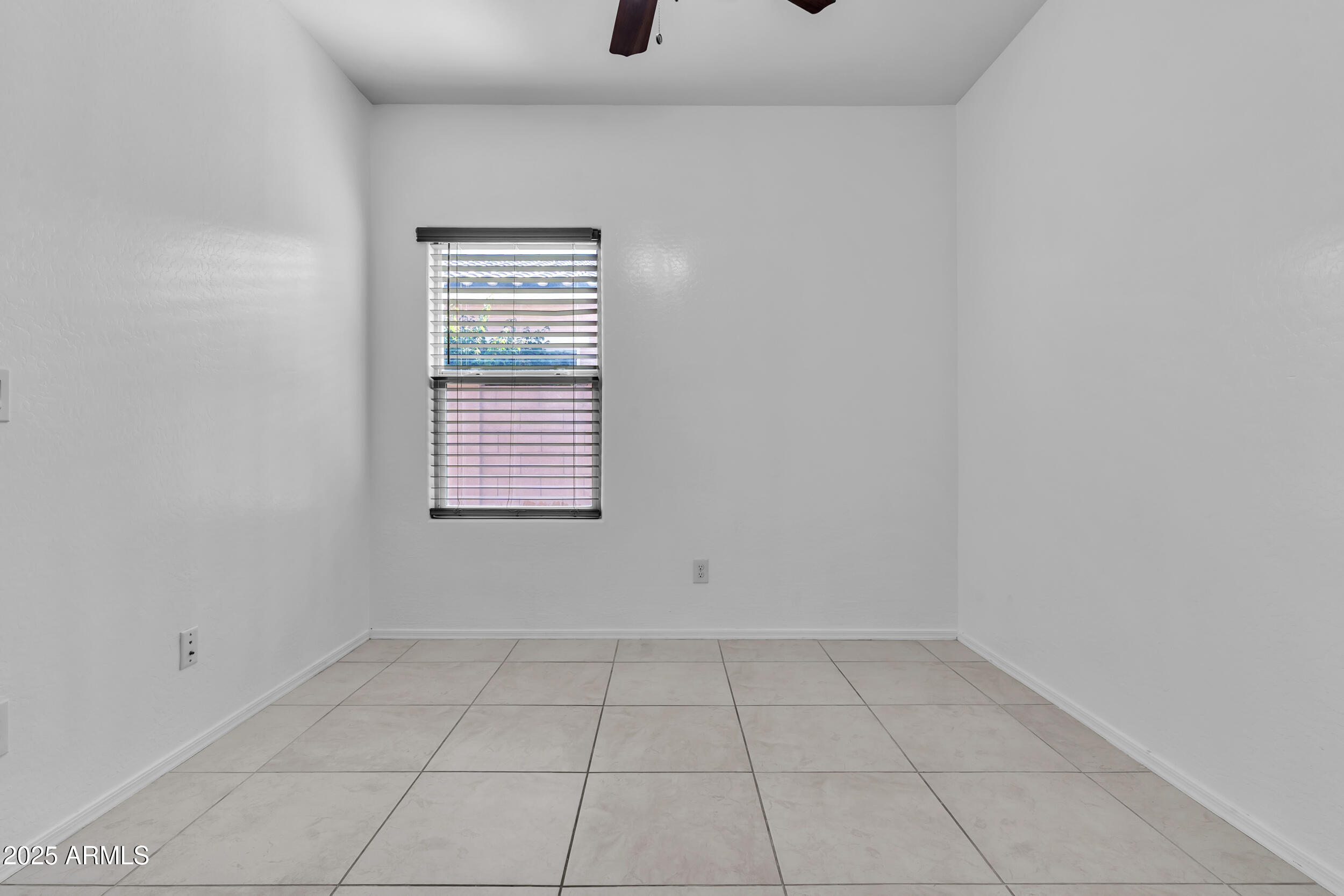 2354 East Bellerive Drive Gilbert, AZ 85298 - Photo 13 of 34 a view of an empty room with a window