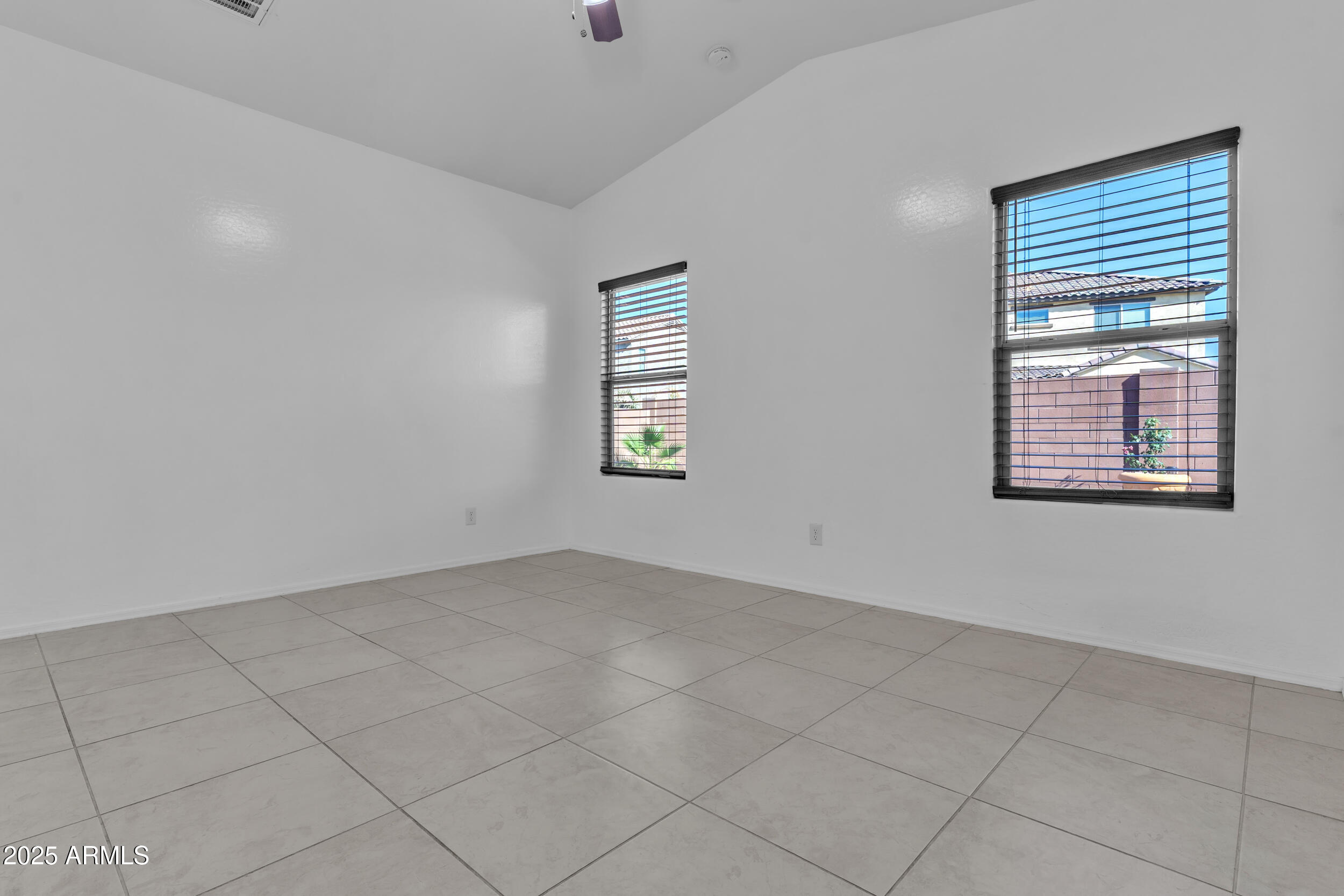 2354 East Bellerive Drive Gilbert, AZ 85298 - Photo 19 of 34 an empty room with windows