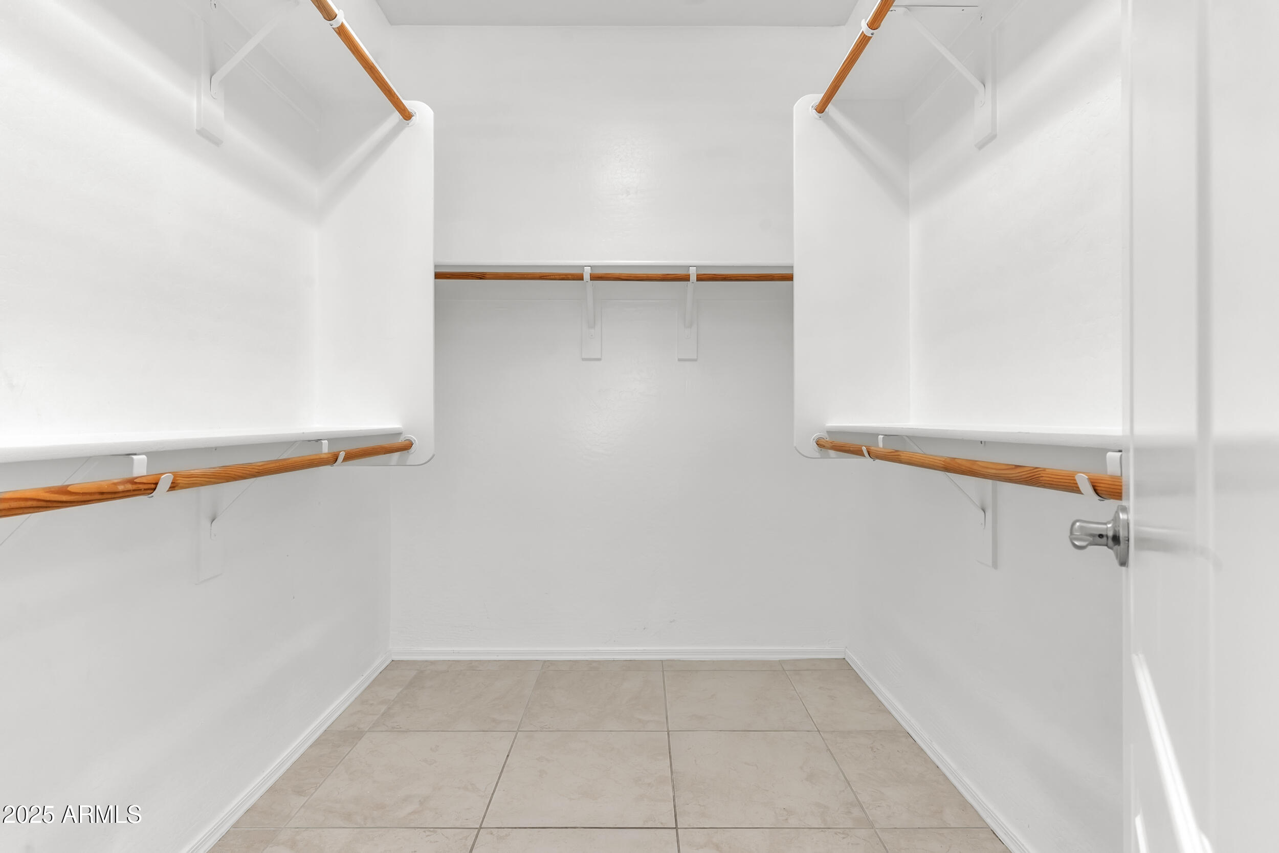 2354 East Bellerive Drive Gilbert, AZ 85298 - Photo 20 of 34 a view of small space with racks on the wall