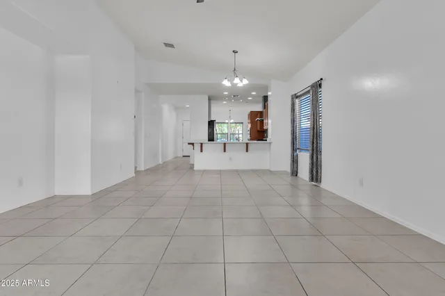 a bathroom with a sink vanity and a mirror