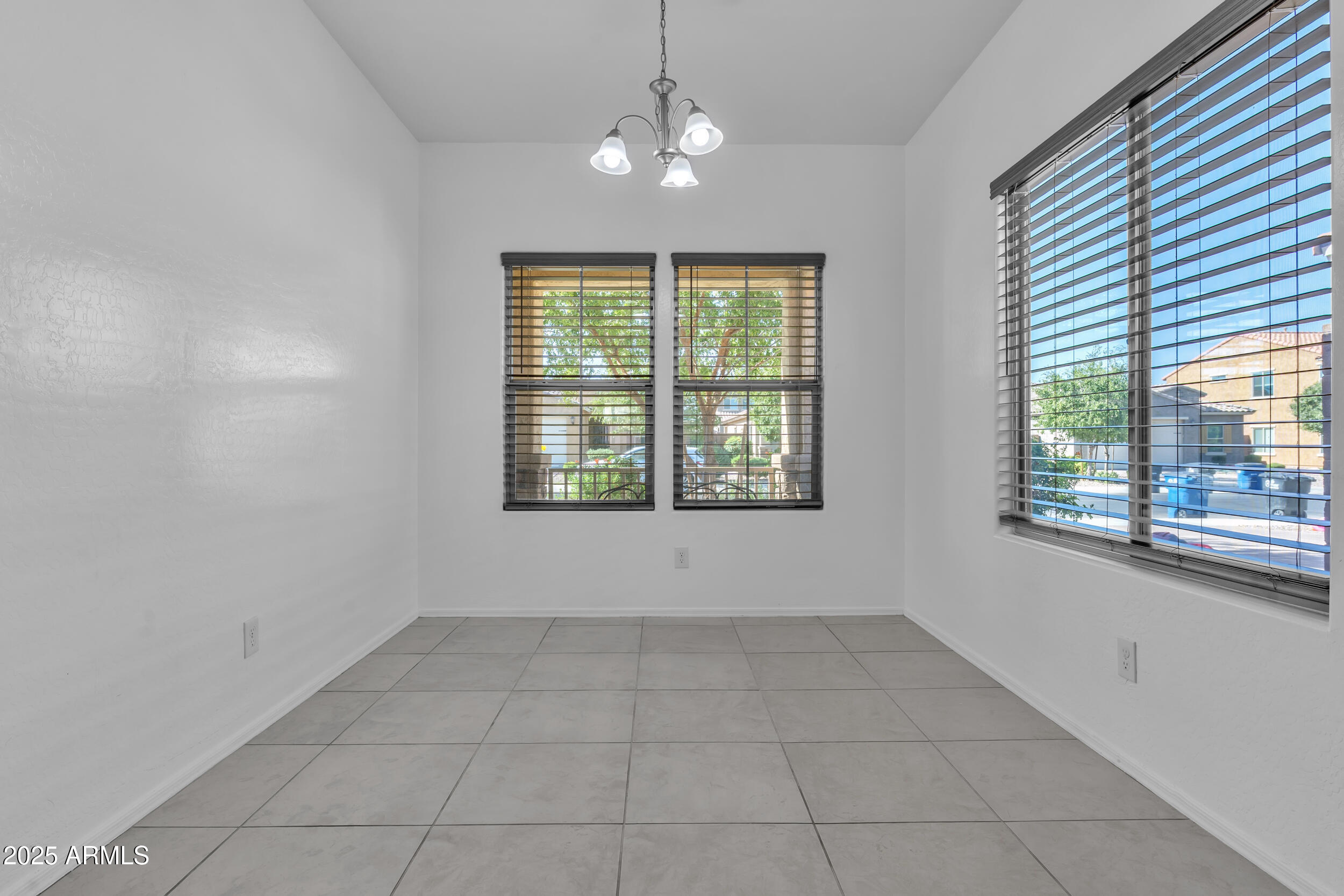 2354 East Bellerive Drive Gilbert, AZ 85298 - Photo 26 of 34 a view of an empty room with a window