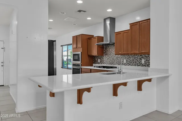 a view of a kitchen with kitchen